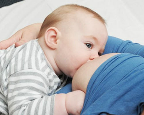 Photo of a baby breastfeeding 