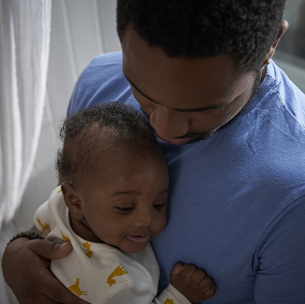 Father holding baby