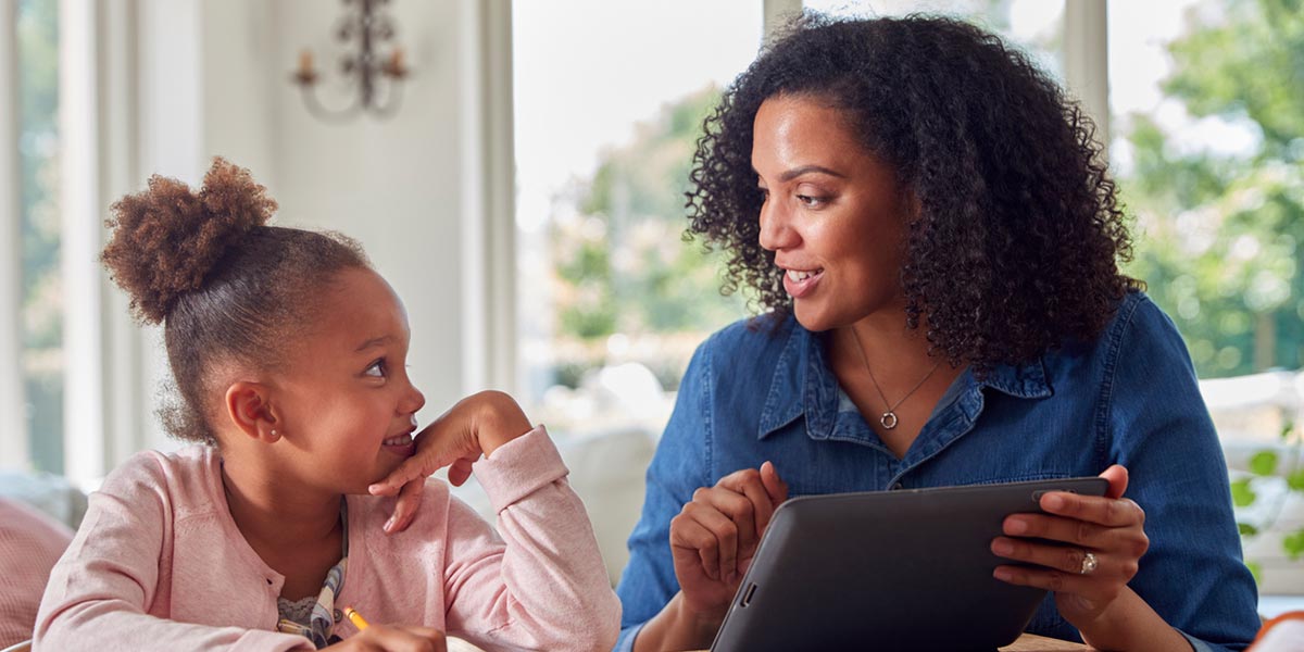 Mother and daughter learning at home