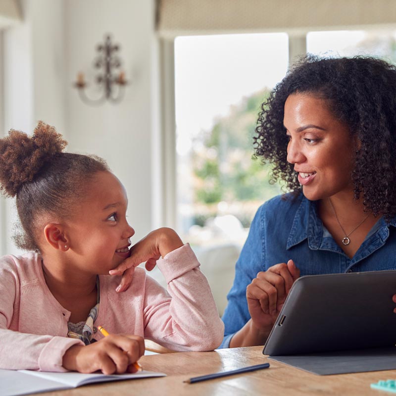 Mother and daughter learning at home