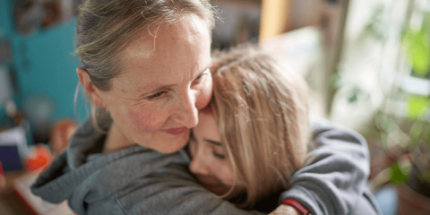 mother-hugging-daughter-banner