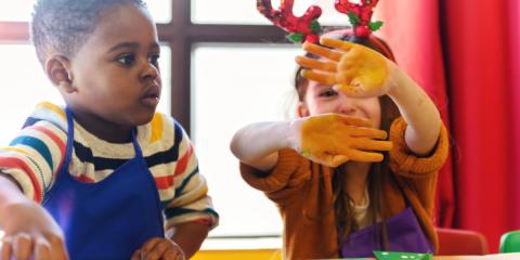 Children making homemade Christmas cards