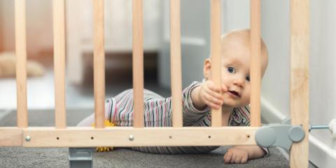 Baby behind safety gate