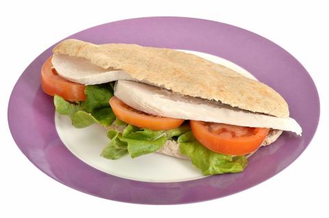 Photo of a chicken and salad pitta