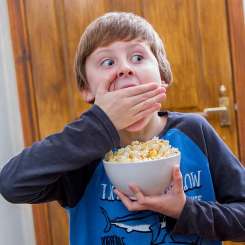 Photo of a child snacking