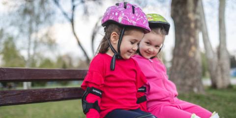 Photo of young girls on bench 