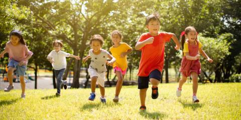 Children running and playing games outdoors