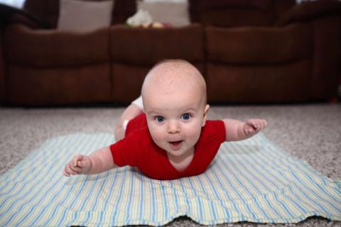 Photo of a baby doing tummy time 