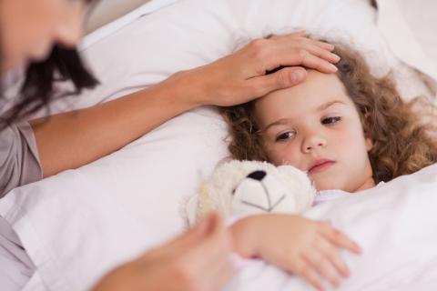 Mother taking care of ill daughter