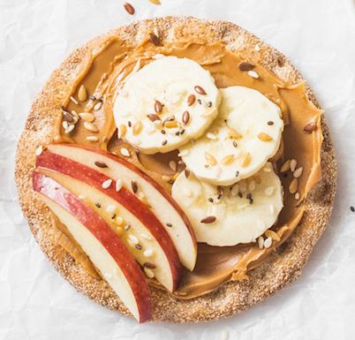 Photo of nutty crackers with fruit on top 