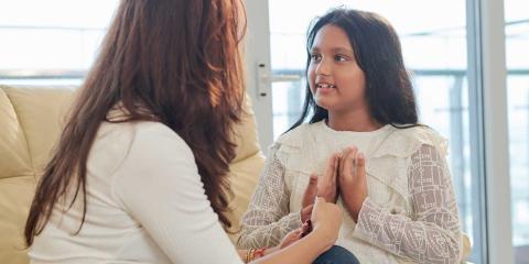 Girl talking to her mother