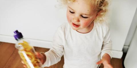 Photo of toddler with pasta shaker