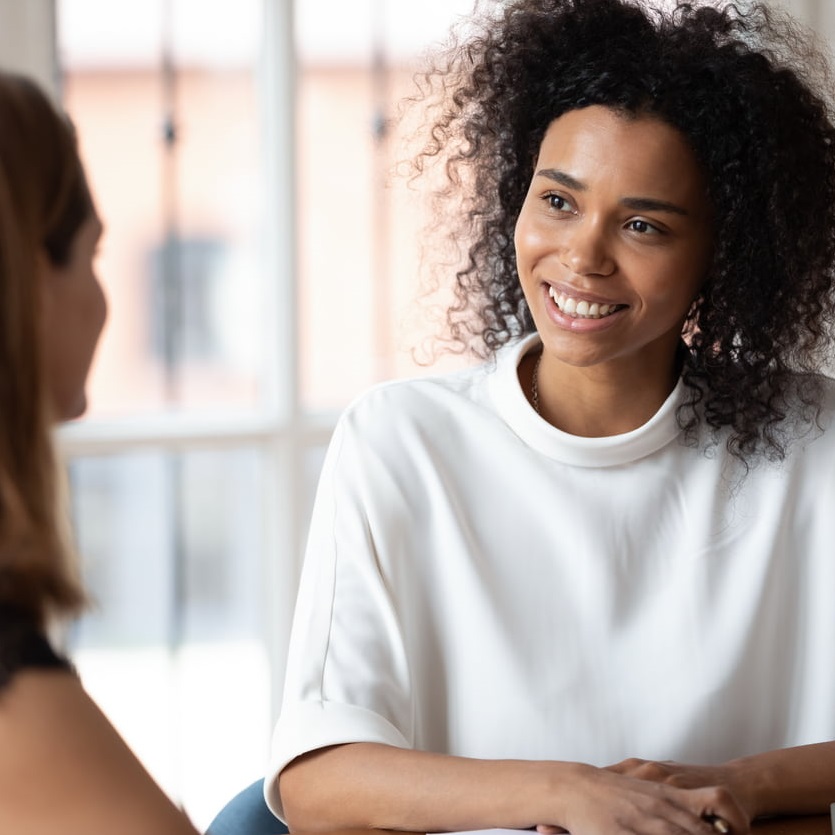 Woman talking to each other